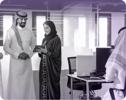 Colleagues collaborating with a tablet in a modern office